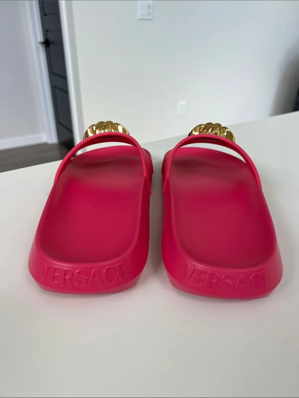 Versace pink la medusa rubber open toe slides sandals gold tone embossed baroque